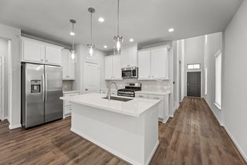 Caso santa rita ranch rental homes in liberty hill, texas kitchen with stainless steel appliances